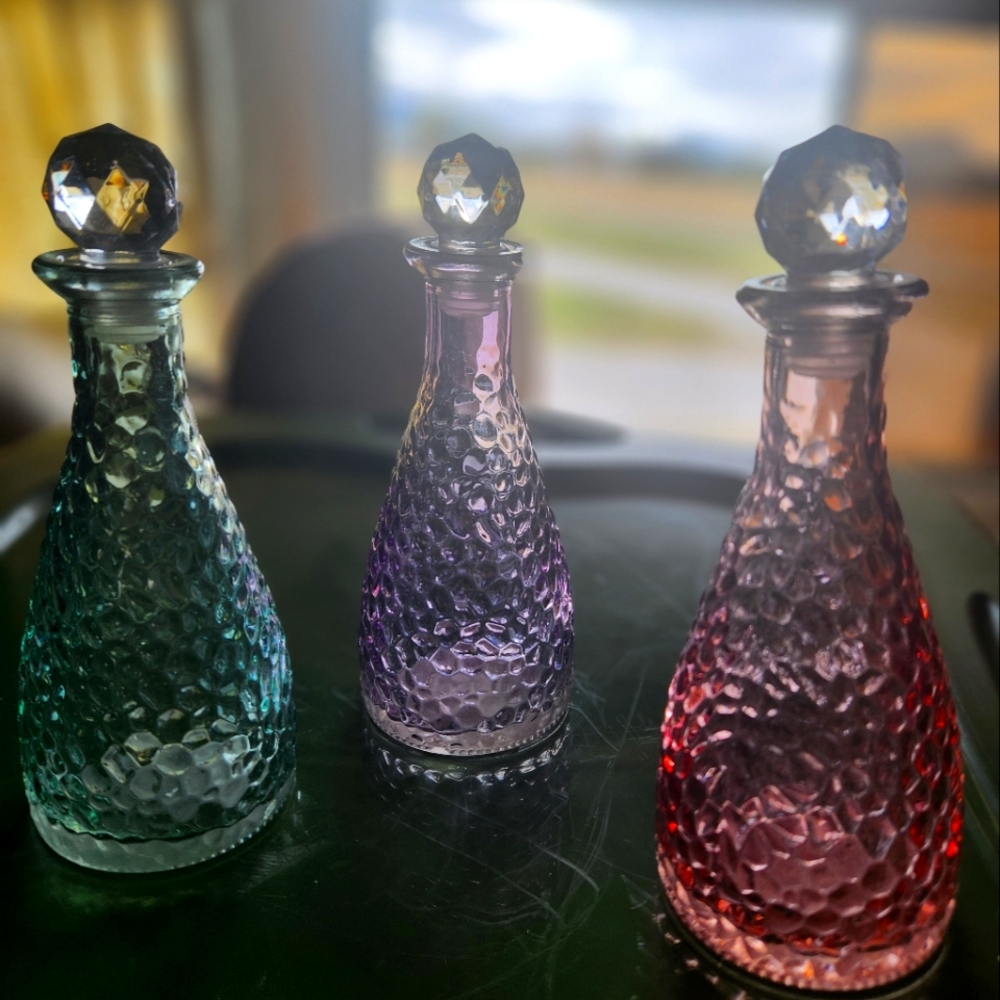 Set of 3 glass bottles